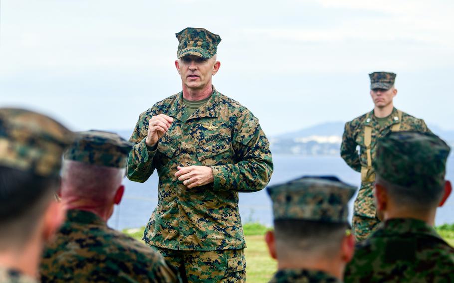 A commander speaks to fellow Marines.