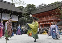 Members of the kemari preservation society, dressed in traditional clothing, give the first kemari performance of the year at Shimogamo Shrine in Kyoto's Sakyo Ward on Jan. 4, 2026. (Mainichi/Tsutomu Koseki)