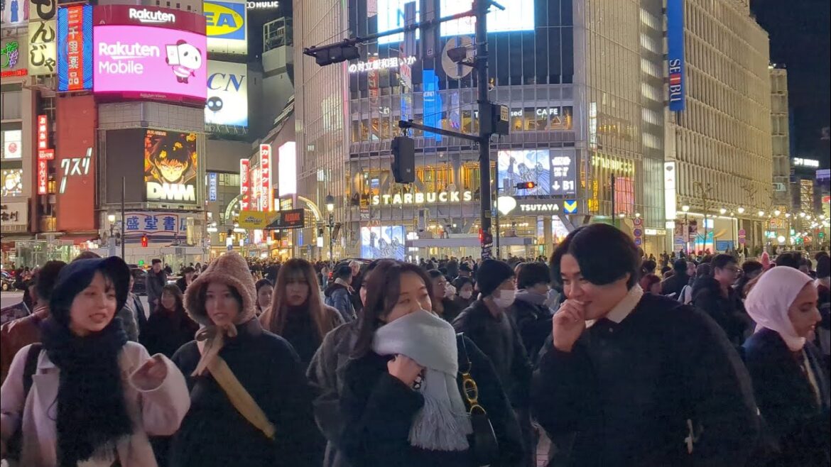Shibuya crossing night walking tour. Tokyo, Japan. 2026
