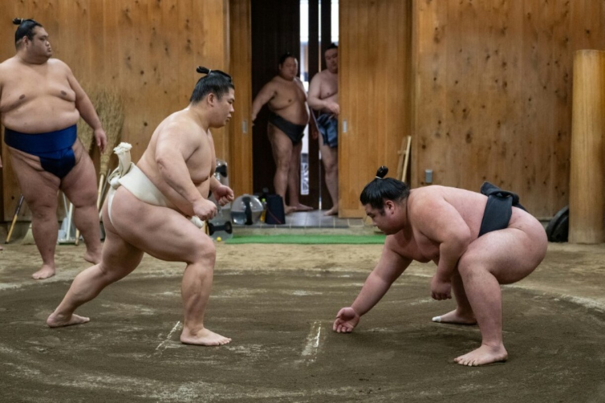 Sumo wrestlers during a practice bout at the Kise sumo stable in Tokyo