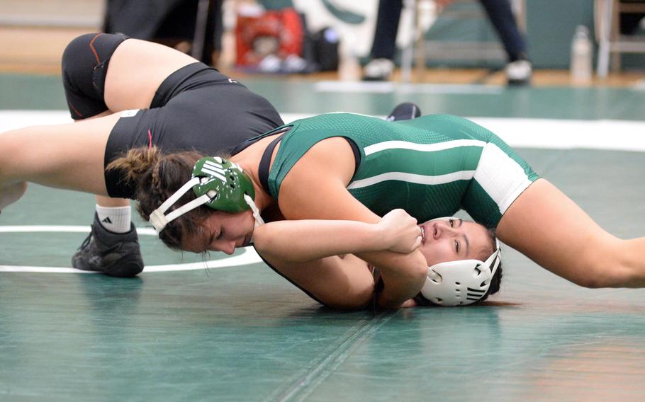 Kubasaki’s Raegan Cayce pins Kadena’s Emily Perez-Golden.
