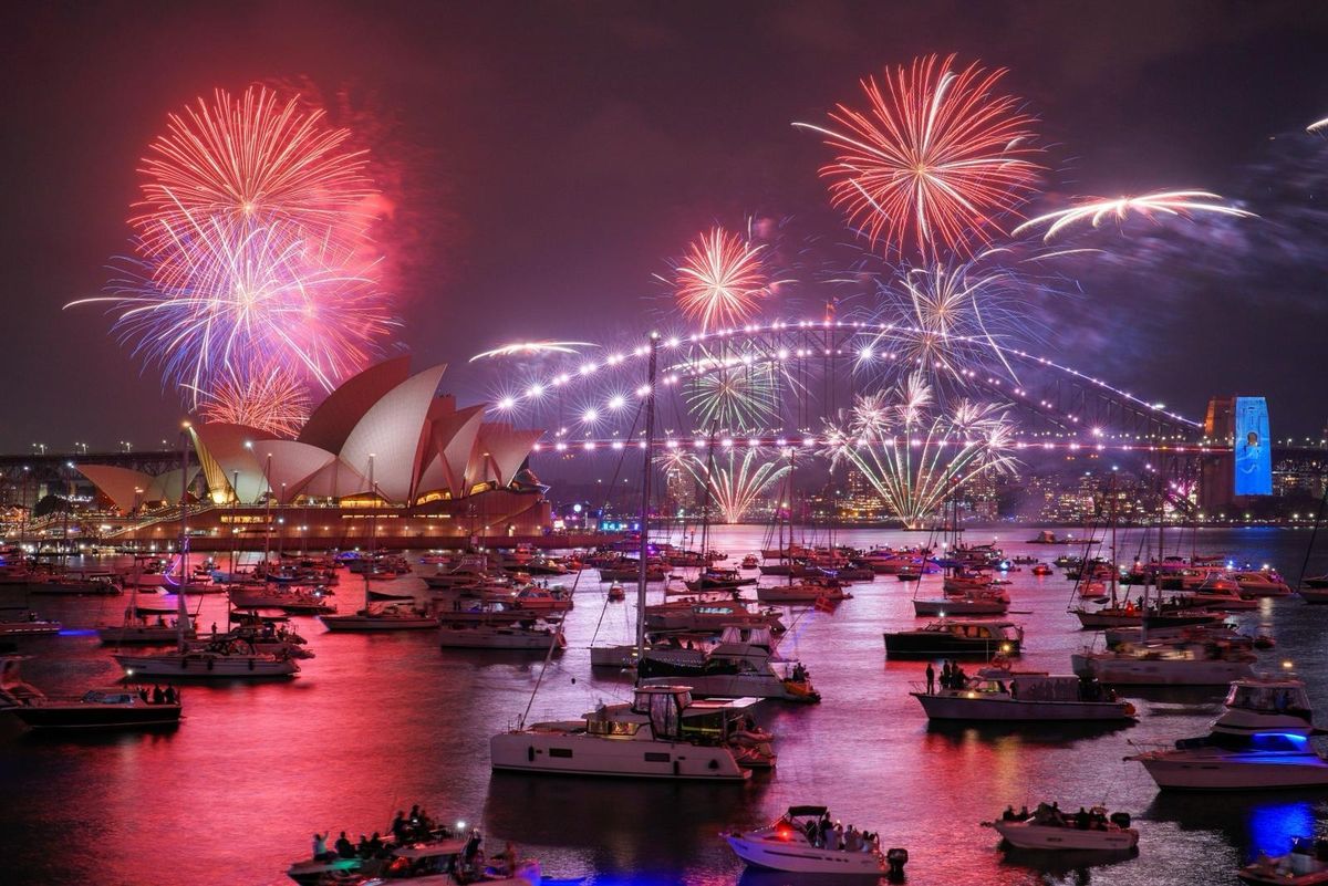 The Country fireworks, light up the sky above the Sydney Opera House and Sydney Harbour Bridge several hours before midnigh