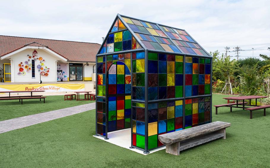 A house-shaped glassware is located outside Ryukyu Glass Village.