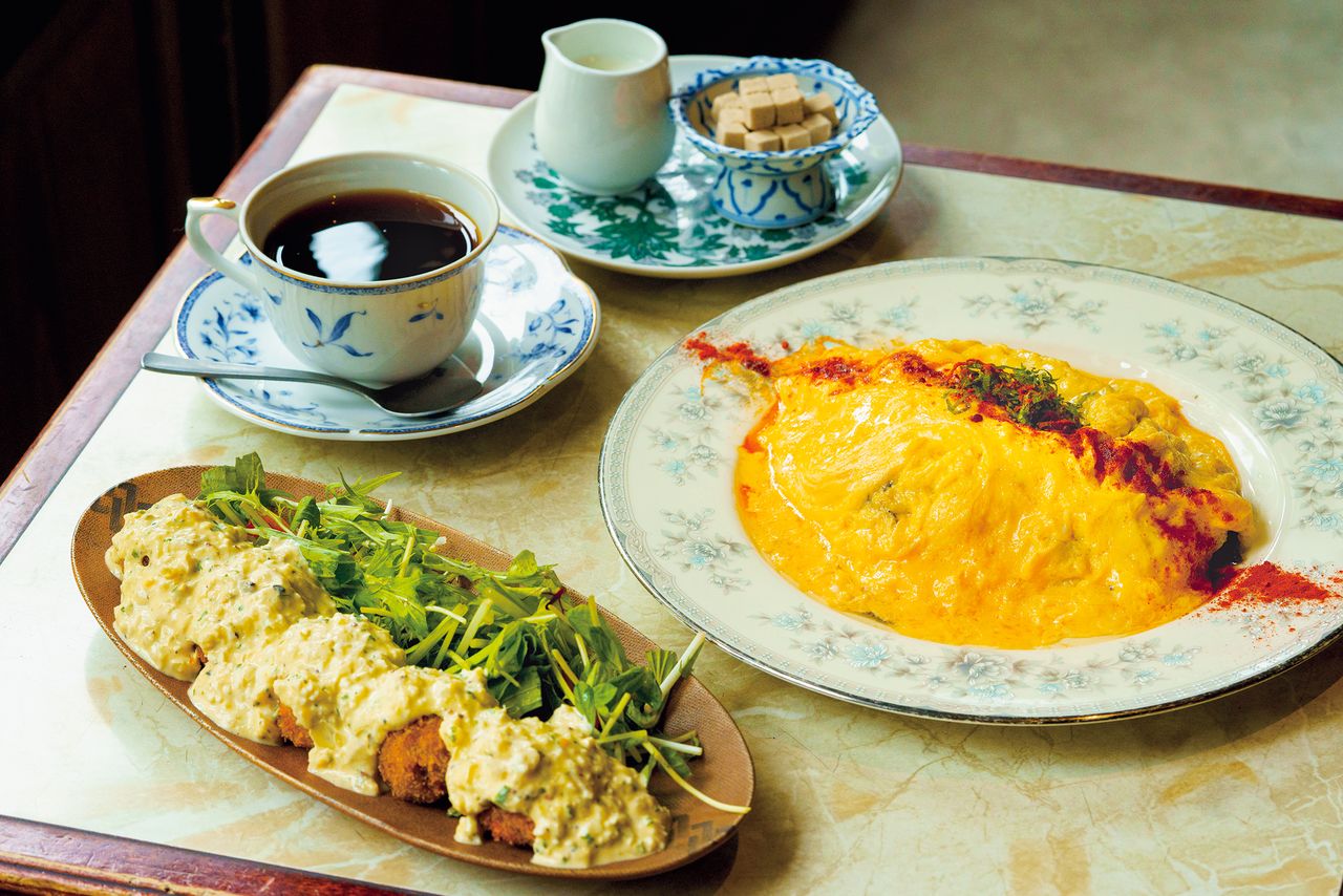 The café’s special omelet over “black” rice and Super Mario mushroom fries.