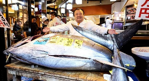 Kiyoshi Kimura, whose company won the tuna auction, is a familiar figure at the annual event