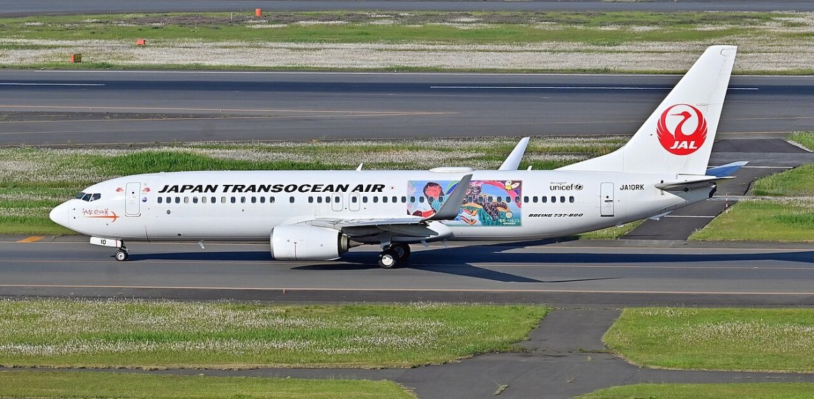 Japan Transocean Air aircraft on the runway before takeoff.