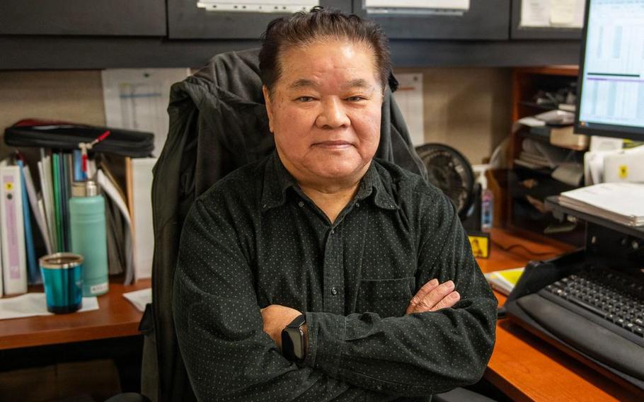 Mr Kiyokazu Ikehara, 718th Civil Engineer Squadron controller from Okinawa poses for a photo.