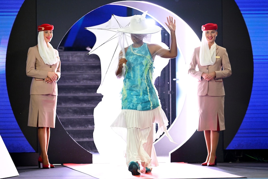 tennis player naomi osaka wears a geisha-style outfit onto court