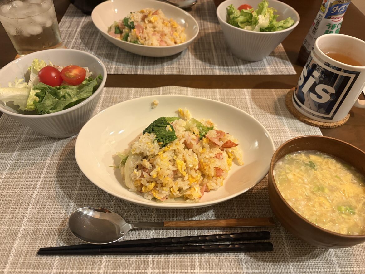 My husband’s "Triple Lettuce Feast" to heal from a busy day. Lettuce fried rice, salad, and egg soup. Simple and so comforting! 🥗🍳✨ [OC]