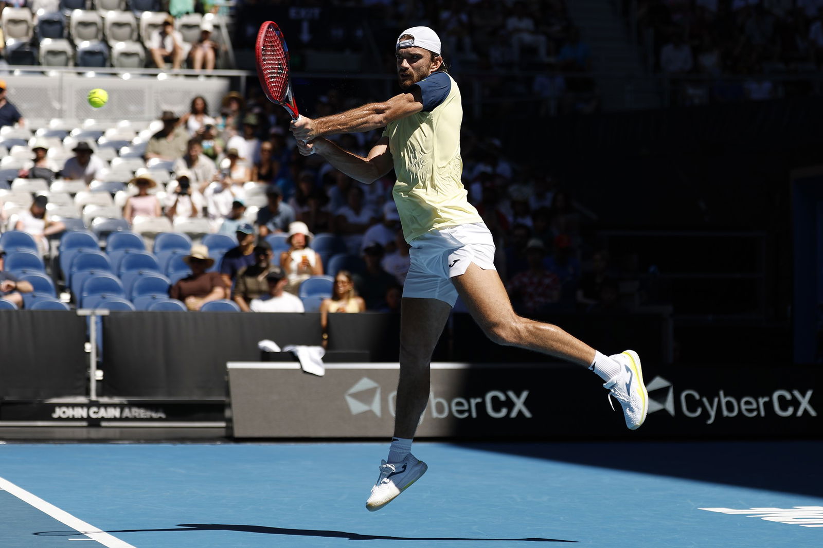Tomas Machac of the Czech Republic plays a backhand in the Men's Singles Third Round against Lorenzo Musetti of Italy during day seven of the 2026 Australian Open at Melbourne Park on January 24, 2026 in Melbourne, Australia. 