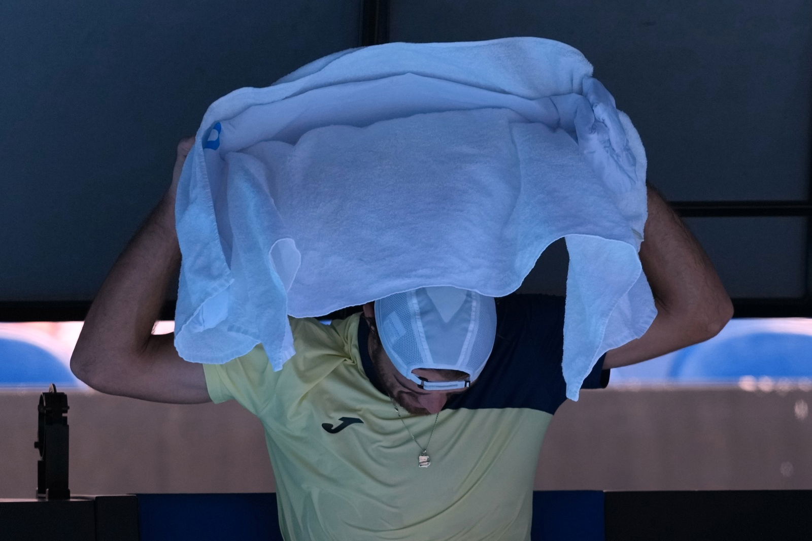 A player puts a wet down on their head.