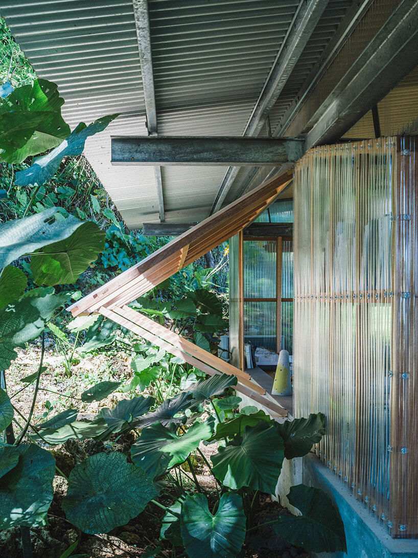 studio cochi architects wraps okinawa workspace in double-skin of insect netting and vinyl