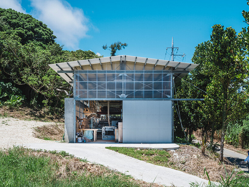 studio cochi architects wraps okinawa workspace in double-skin of insect netting and vinyl