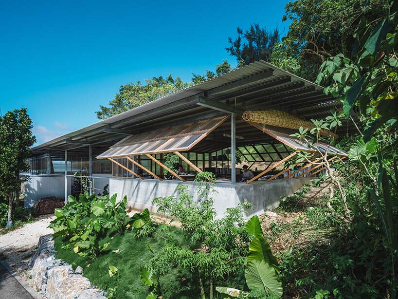 studio cochi architects wraps okinawa workspace in double-skin of insect netting and vinyl