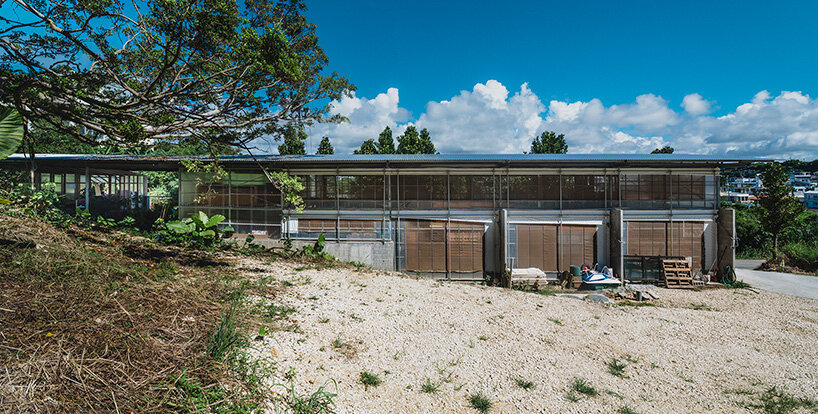 studio cochi architects wraps okinawa workspace in double-skin of insect netting and vinyl