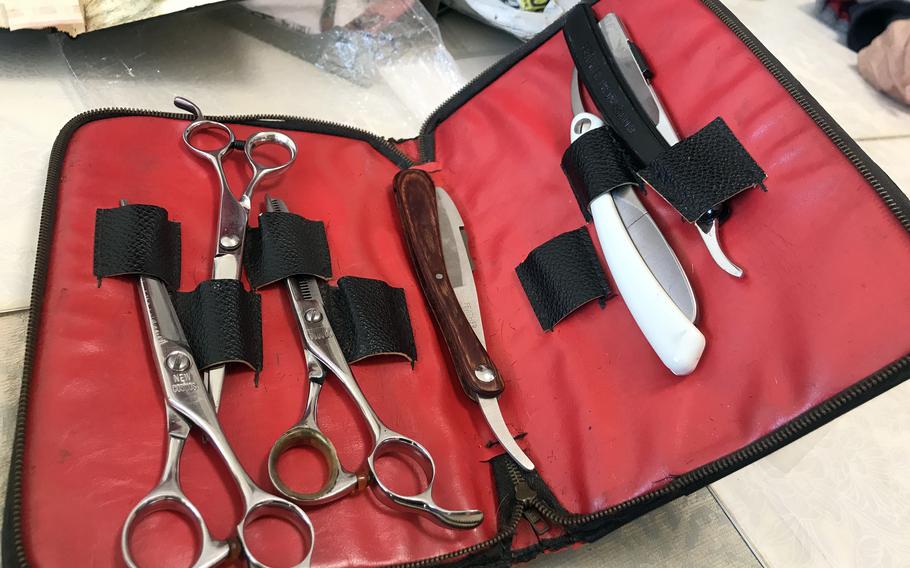 A case full of barber’s tools.