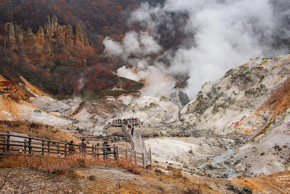 Pathway through steaming Sulphur pits, Hell Valley, Shikotsu-Toya National Park, Noboribetsu, Hokkaido, Japan.