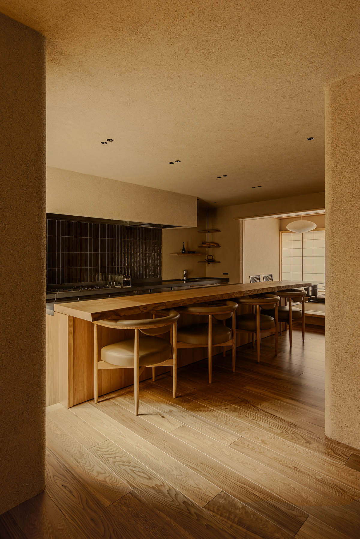 kooo architects creates a wooden interior sanctuary for contemporary accommodation in Kyoto City