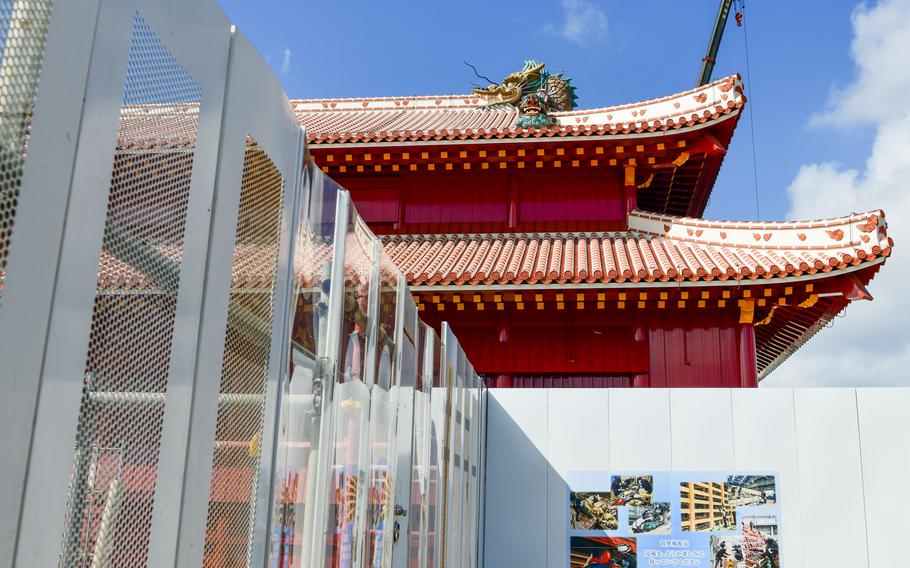 A clear construction wall keeps a castle’s main hall off limits to visitors. 