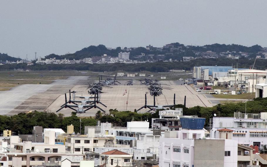 Aircraft are seen on the runway at Marine Corps Air Station Futenma.