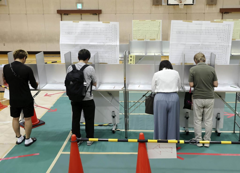 Voters cast ballots in Tokyo during the 2025 upper house election. Japan’s prime minister may visit North Korea over abductee talks, depending on election results. Photo: Kyodo