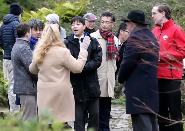 The Mayor of Matsue, Japan, Mayor Uesada enjoying his tour of Lafcadio Hearn Japanese Gardens. 