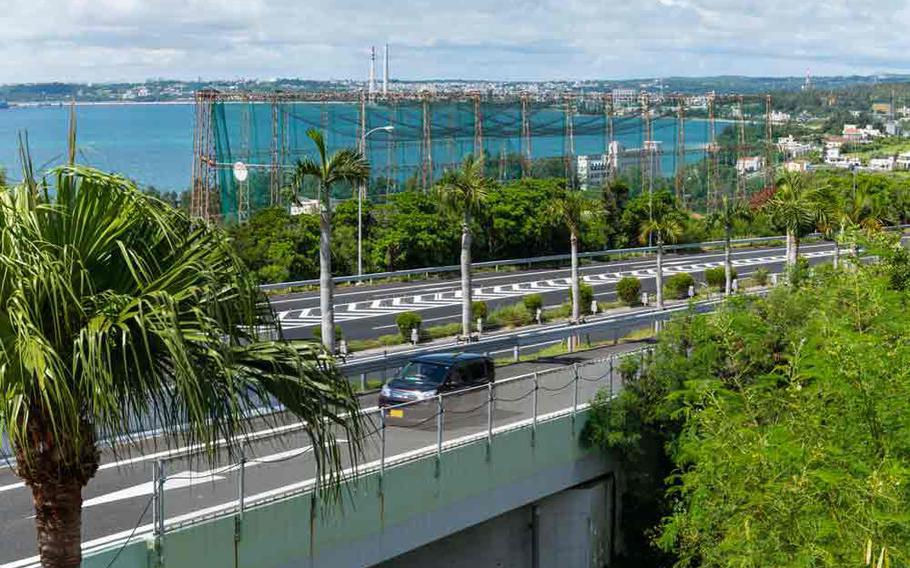 A black car on Okinawa highway