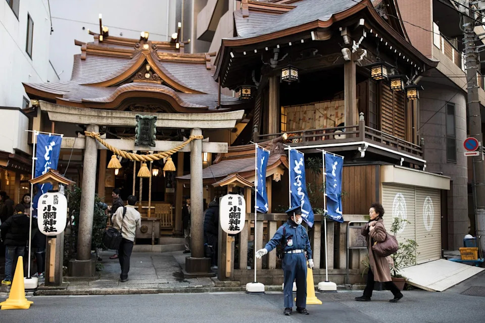 Representative. File image. A guard stands in front of the Koami Shinto shrine in Tokyo, Japan. - An association of Shinto shrines has called on ‘shrines across the country to be vigilant’ as there has been a surge in theft of shrines’ copper roof plates nationwide (AFP via Getty Images)