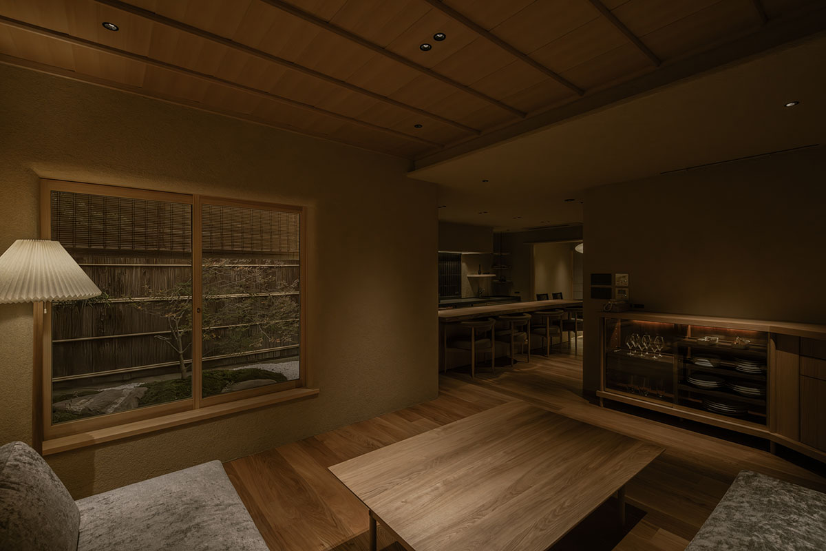 kooo architects creates a wooden interior sanctuary for contemporary accommodation in Kyoto City