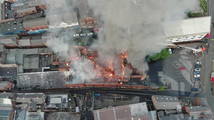 A drone image shows the fire raging in the bottom floor of the former nightclub Pic: @lfrsdrone / Twitter