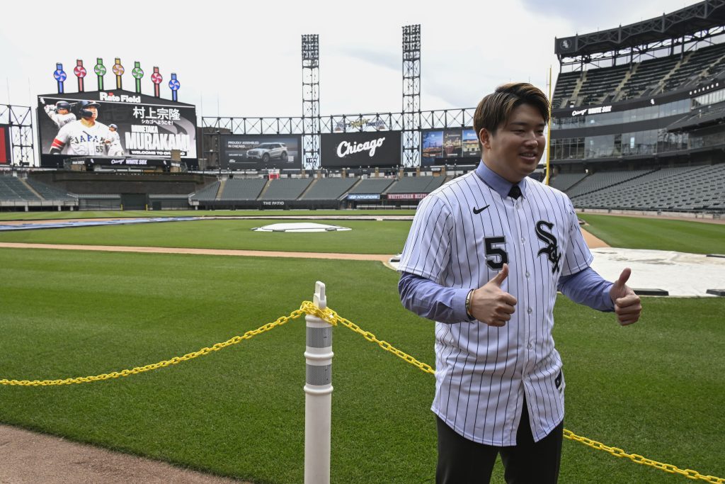 Dec 22, 2025; Chicago, Il, USA; New Chicago White Sox player Munetaka Murakami gives a thumbs up on the field after a press conference where he was introduced at Rate Field.