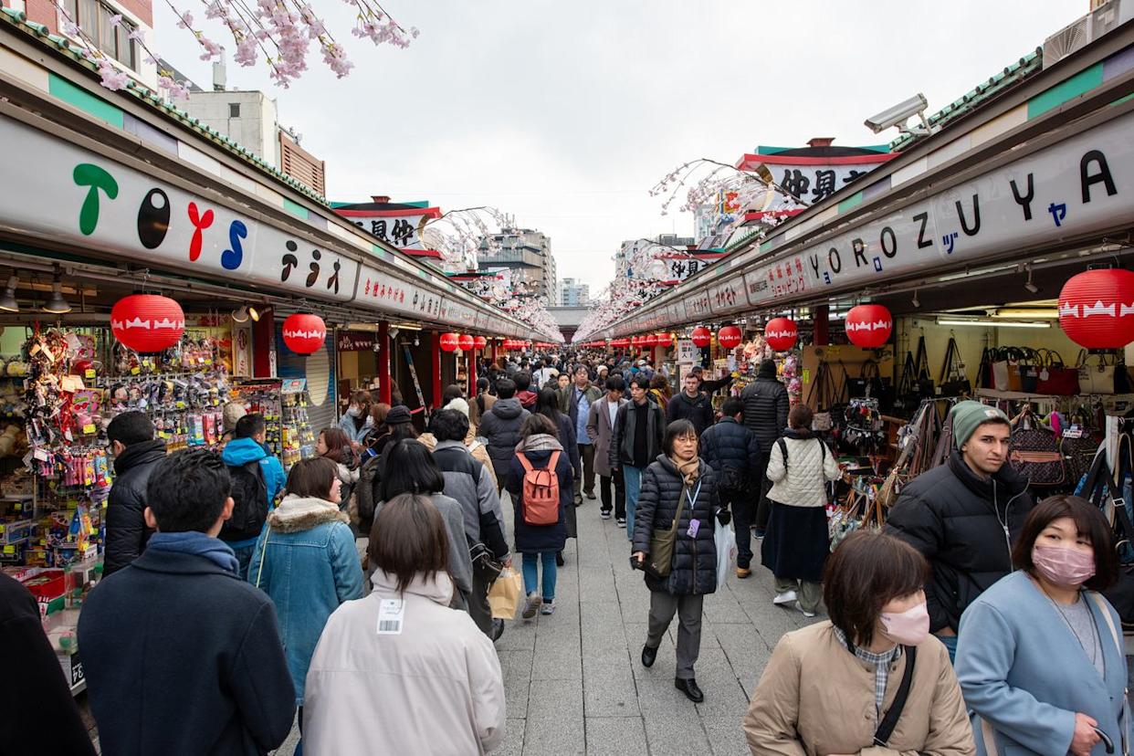 A crowd outside of Senso-ji Temple. Manorath Naphaphone/Travel + Leisure
