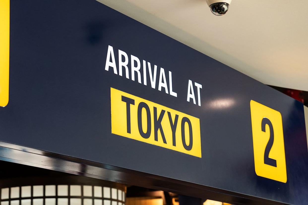A sign at the arrivals hall in the Tokyo airport. Diy13/Getty Images