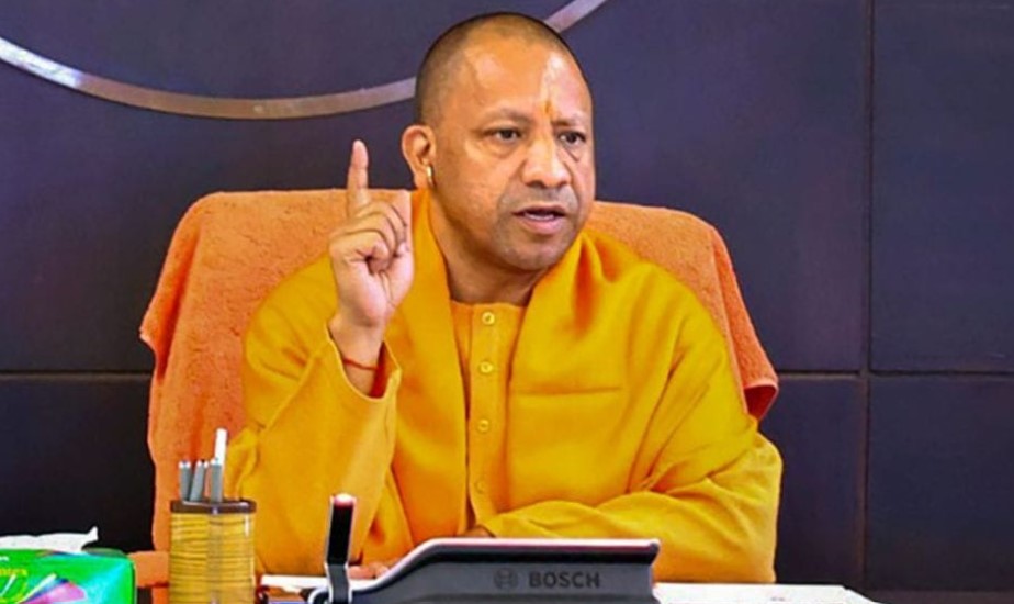 CM Yogi always wears saffron clothes. He will be in the same attire uring his Singapore and Japan tours.