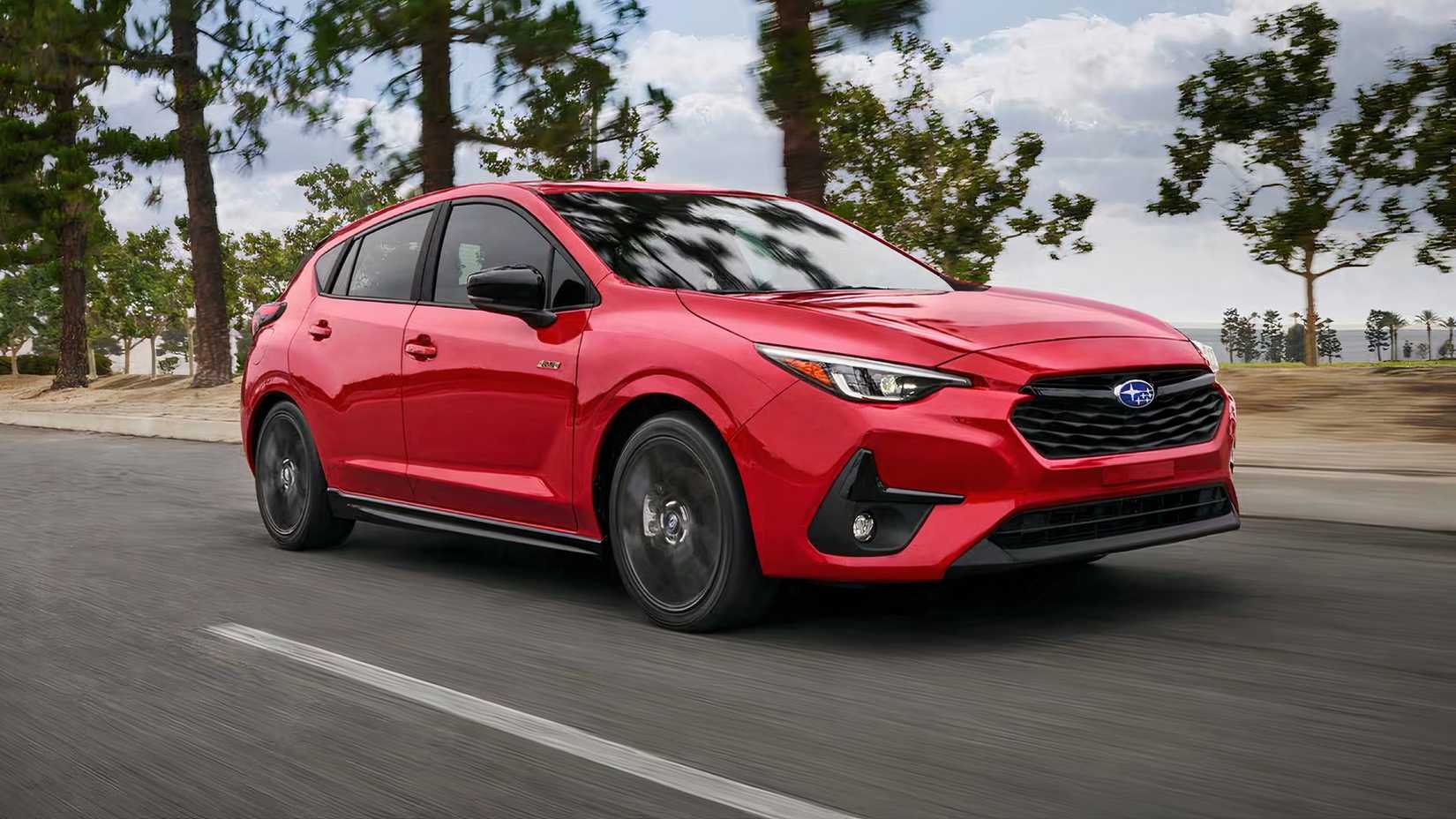 2026 Subaru Impreza RS in red driving on road