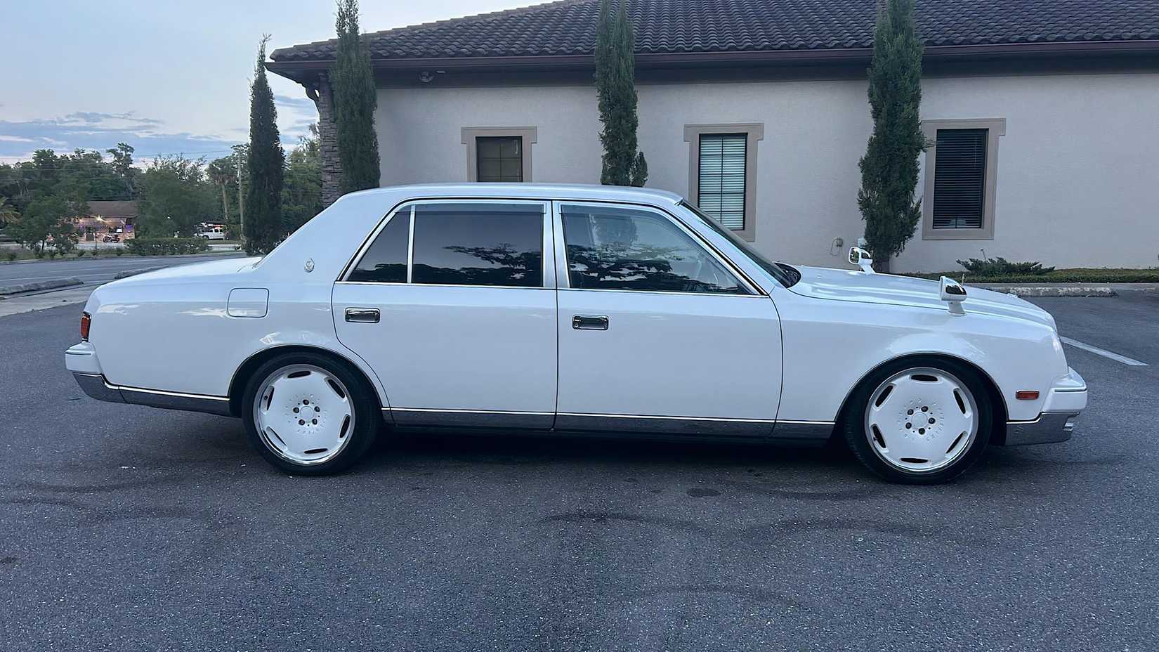 1997 Toyota Century G50 in white posing in parking lot