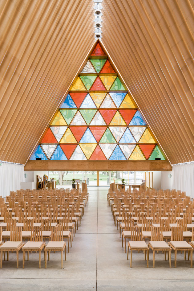 Cardboard Cathedral with seats inside by Shigeru Ban