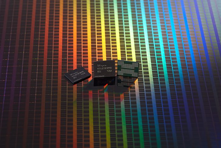 Three SK hynix H25G1G8F4MN9R memory chips displayed on a colorful silicon wafer background.