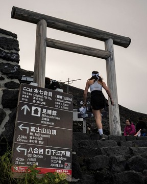 Hikers make their way toward the seventh station for a short break.