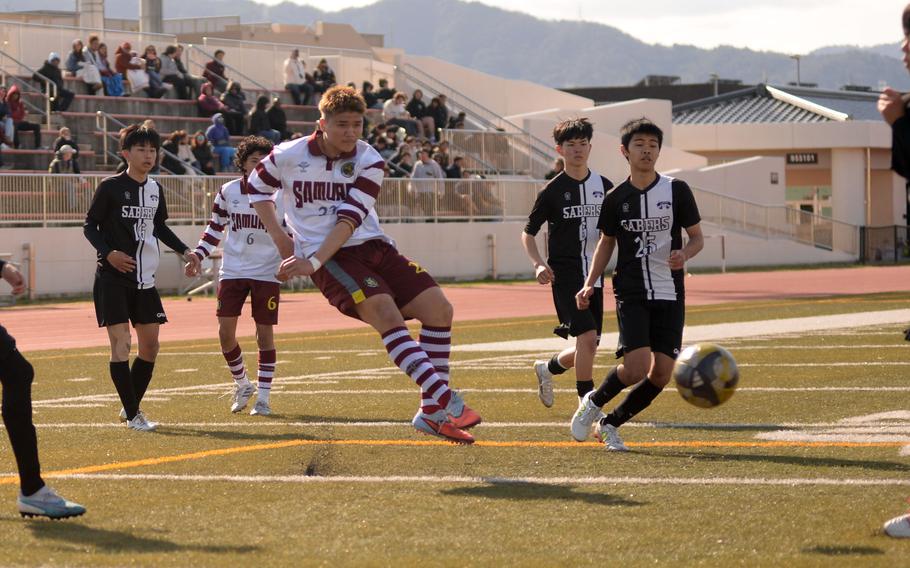 Noah Charles passes the ball.