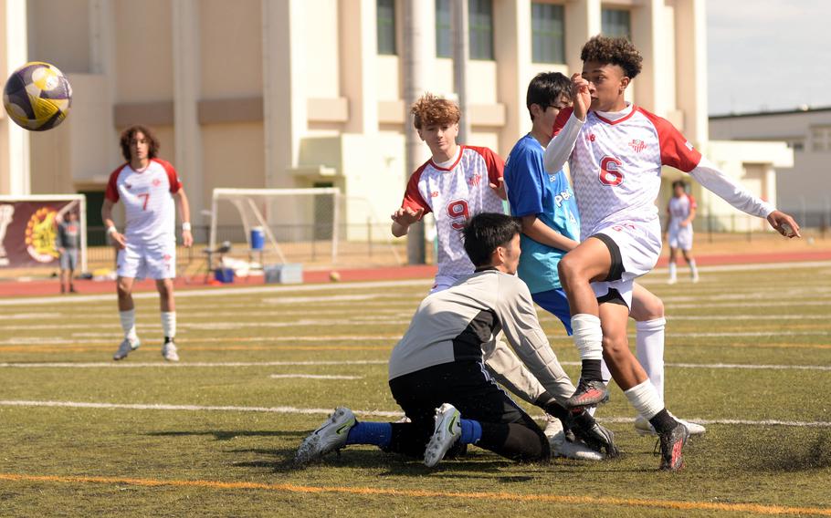 Gianni Stevens fires toward goal.