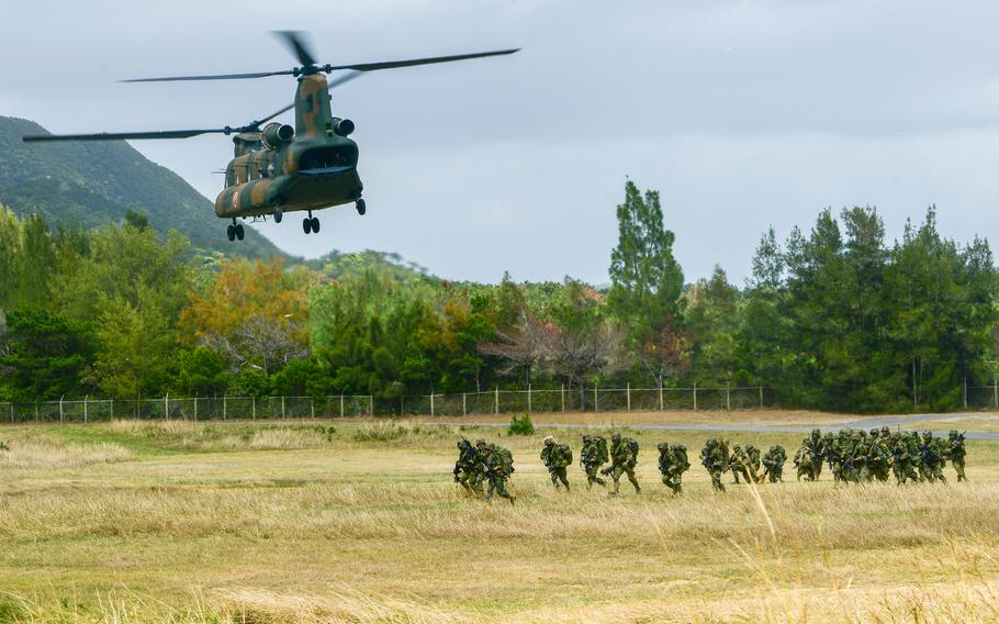 A Japanese CH-47 dropping off Japanese soldiers.
