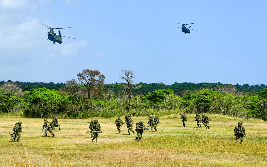 Japanese soldiers in a field.