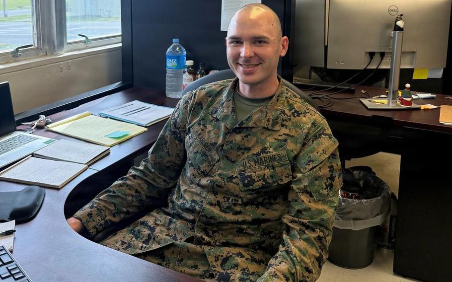 U.S. Marine Corps Cpl. Todd Karlsen, a native of Washington and an administrative specialist with the Reserve Affairs Branch, III Marine Expeditionary Force, poses for a photo.