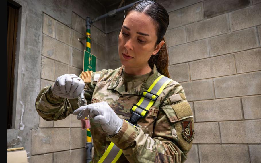 U.S. Air Force Senior Airman Mary Clift, 18th Operational Medical Readiness Squadron bioenvironmental engineering technician, tests a water sample.
