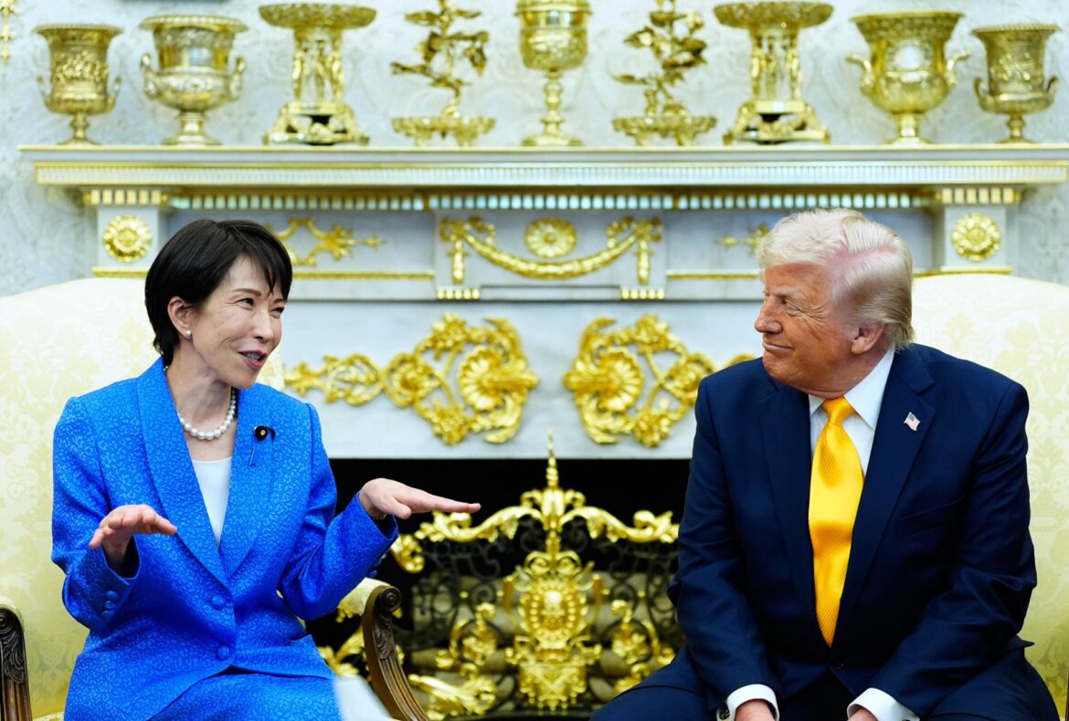 U.S. President Donald Trump speaks with Japan
