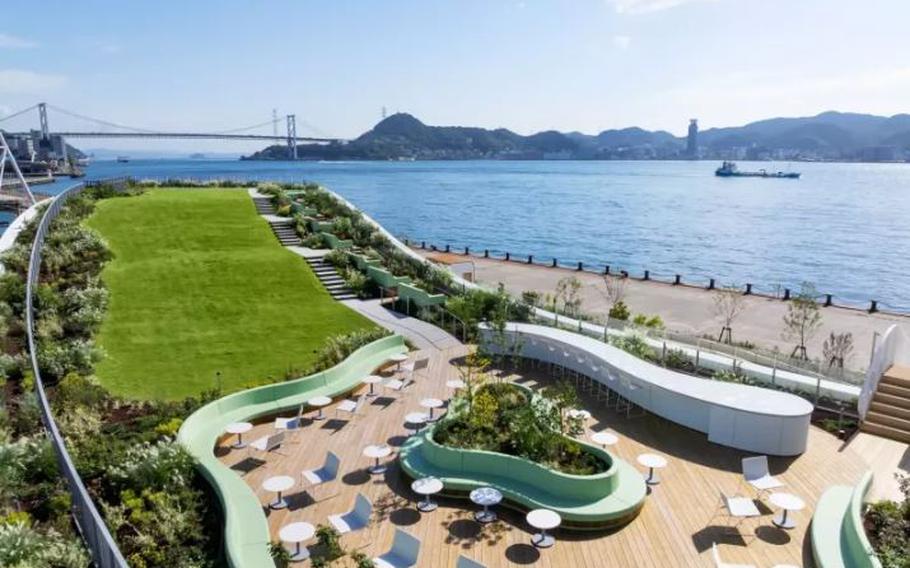 Kanmon Strait, tables and chairs in the site of the hotel are visible.
