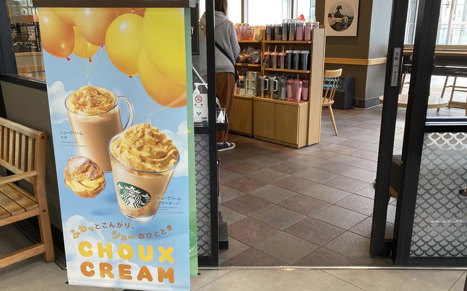 A sign inside a coffee shop advertises a new drink option.