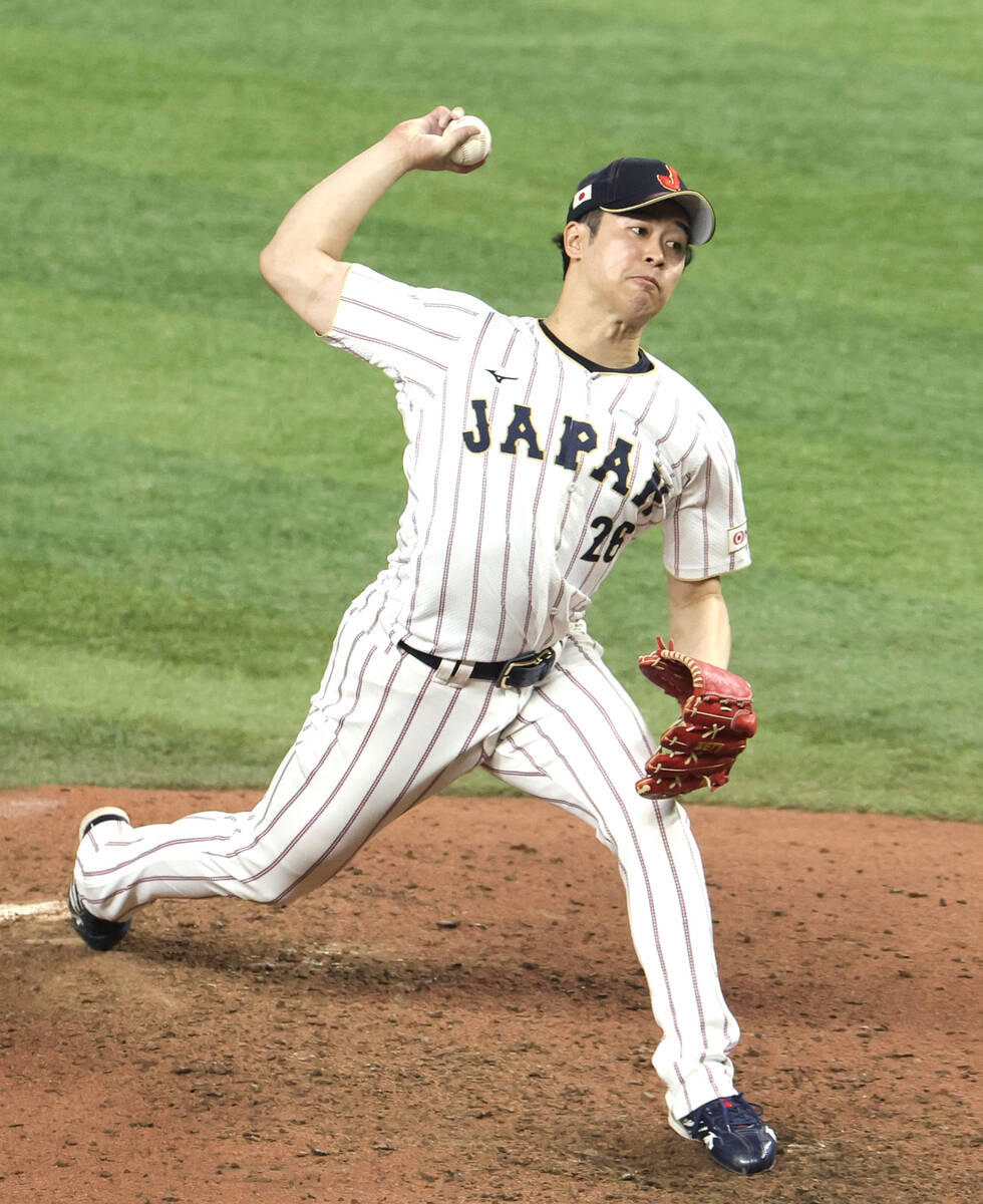 Taneichi throws with all his might (Photo by Daisuke Iwata)
