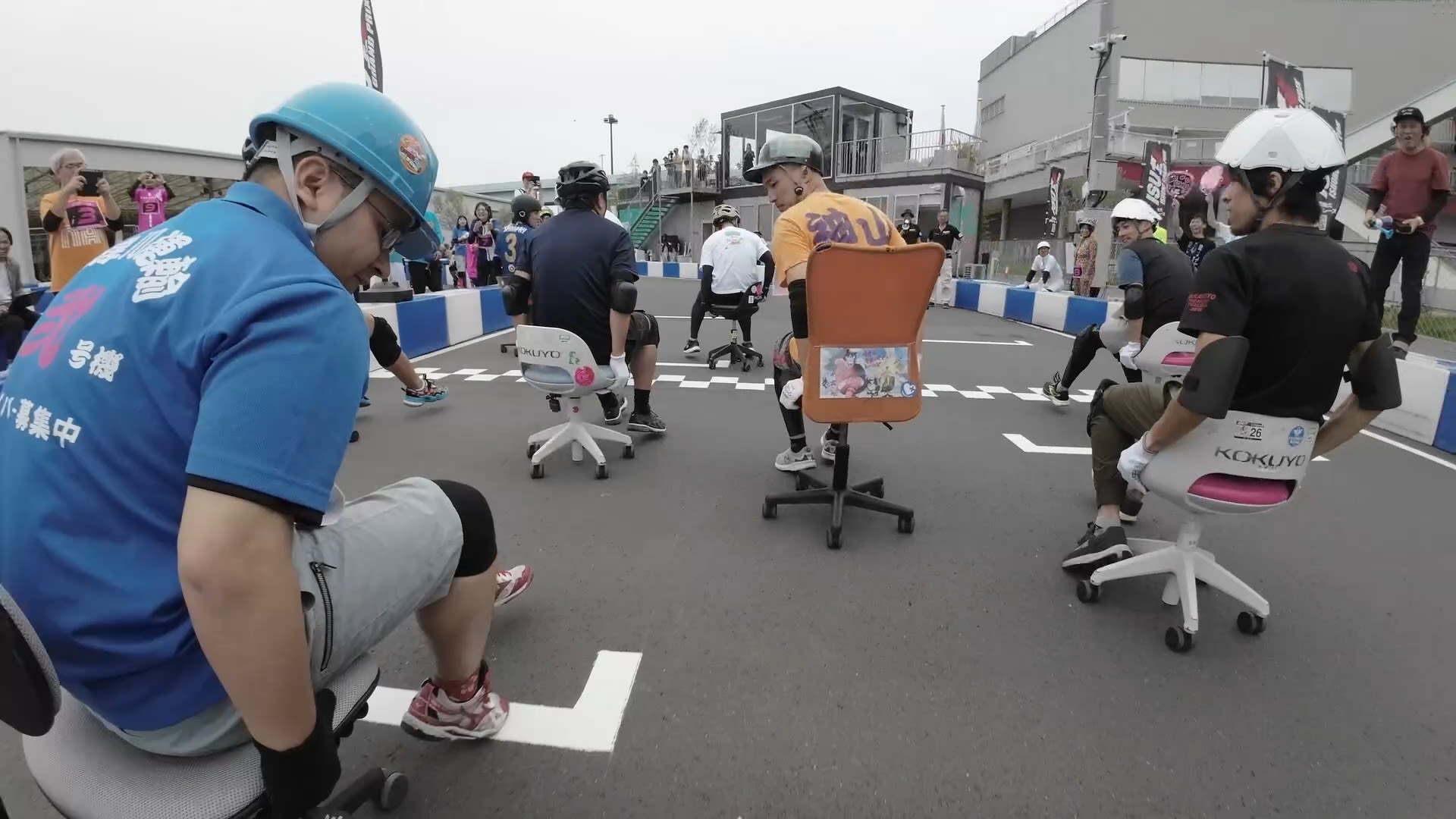 <p>Yasunori Miura joins an office chair race in Odaiba, Tokyo, where competitors race to complete as many laps as they can within two hours.</p>